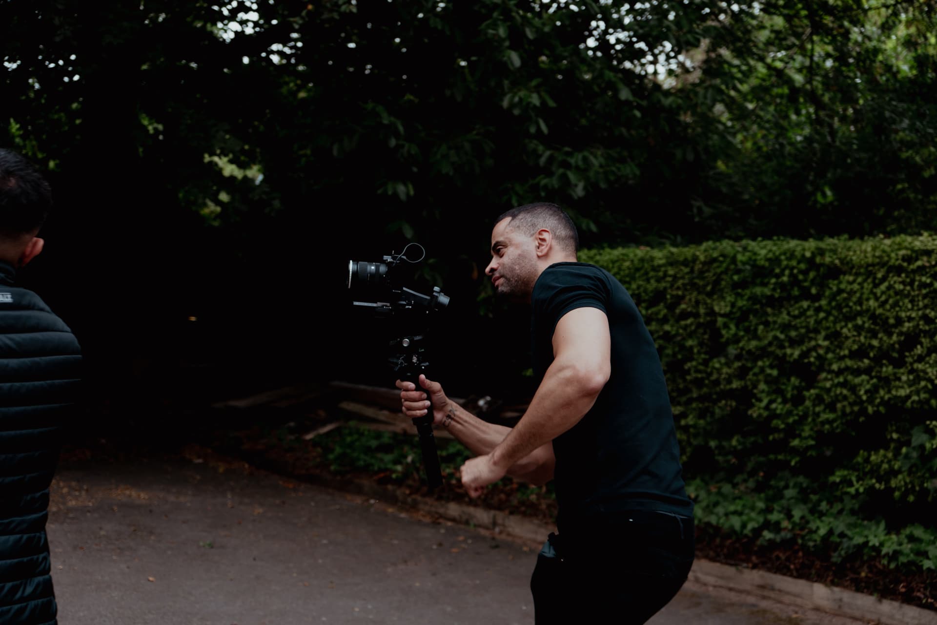 Clinton setting up a shot on location